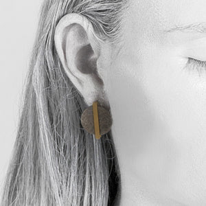Earring made of sand with gold plated details